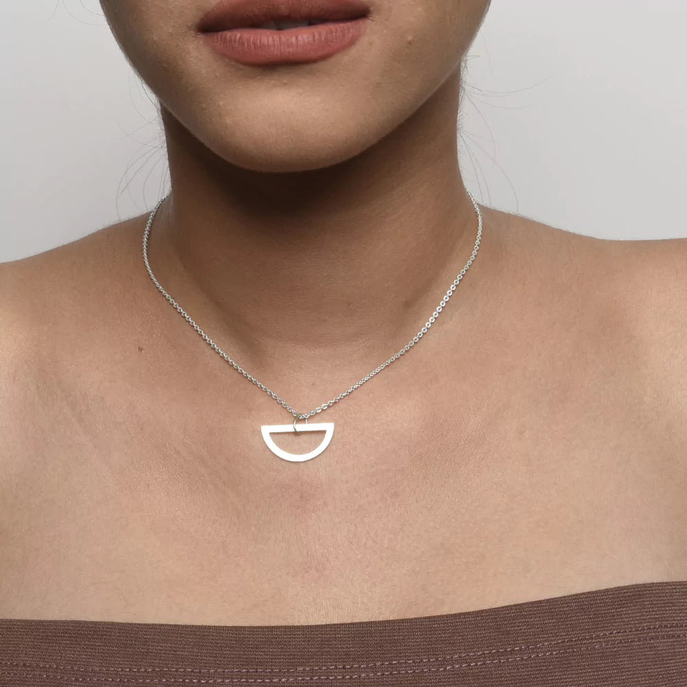 half circle pendant necklace, modern minimalist jewelry, chic pendant necklace, elegant half circle pendant, contemporary jewelry design, stylish half circle pendant