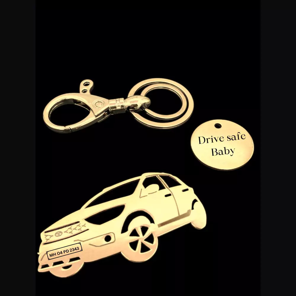 Gold Tata Tiago NRG keychain made from brass with custom number plate