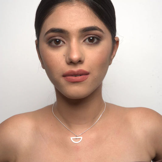 half circle pendant necklace, modern minimalist jewelry, chic pendant necklace, elegant half circle pendant, contemporary jewelry design, stylish half circle pendant