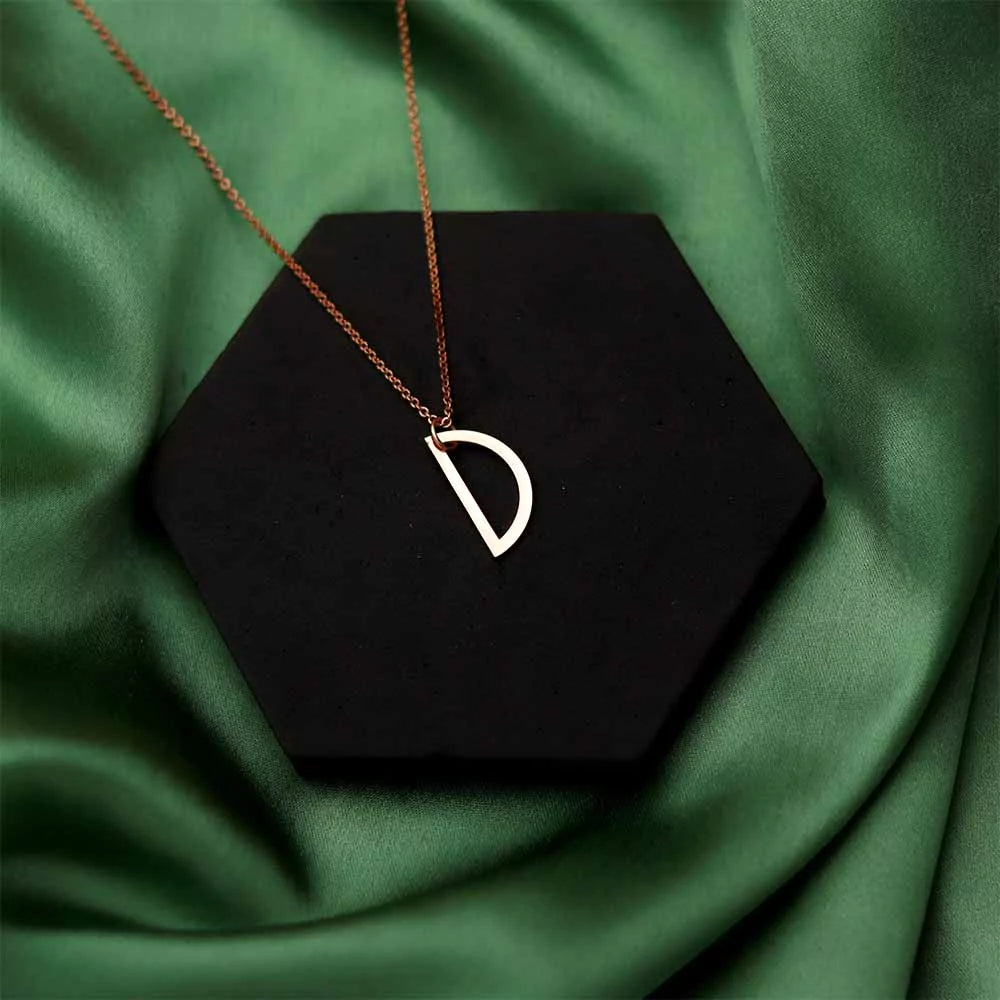 half circle pendant necklace, modern minimalist jewelry, chic pendant necklace, elegant half circle pendant, contemporary jewelry design, stylish half circle pendant