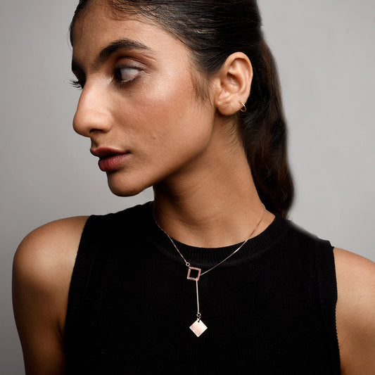 Squaring Off Necklace with sleek squared pendant on a modern chain