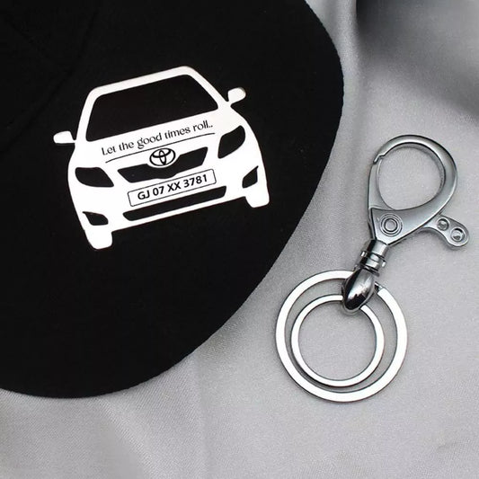 Toyota Corolla 2009 personalized keychain in silver finish.