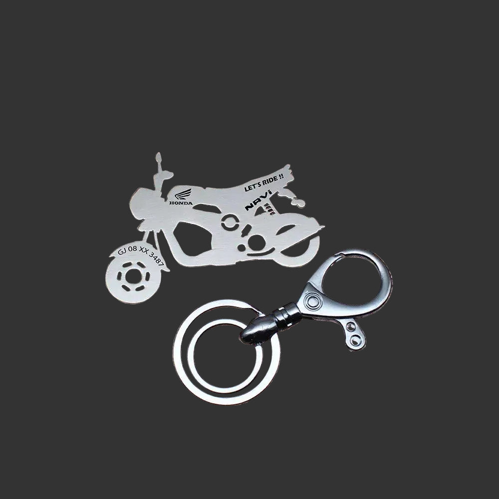 Compact metal keychain inspired by Honda Navi style