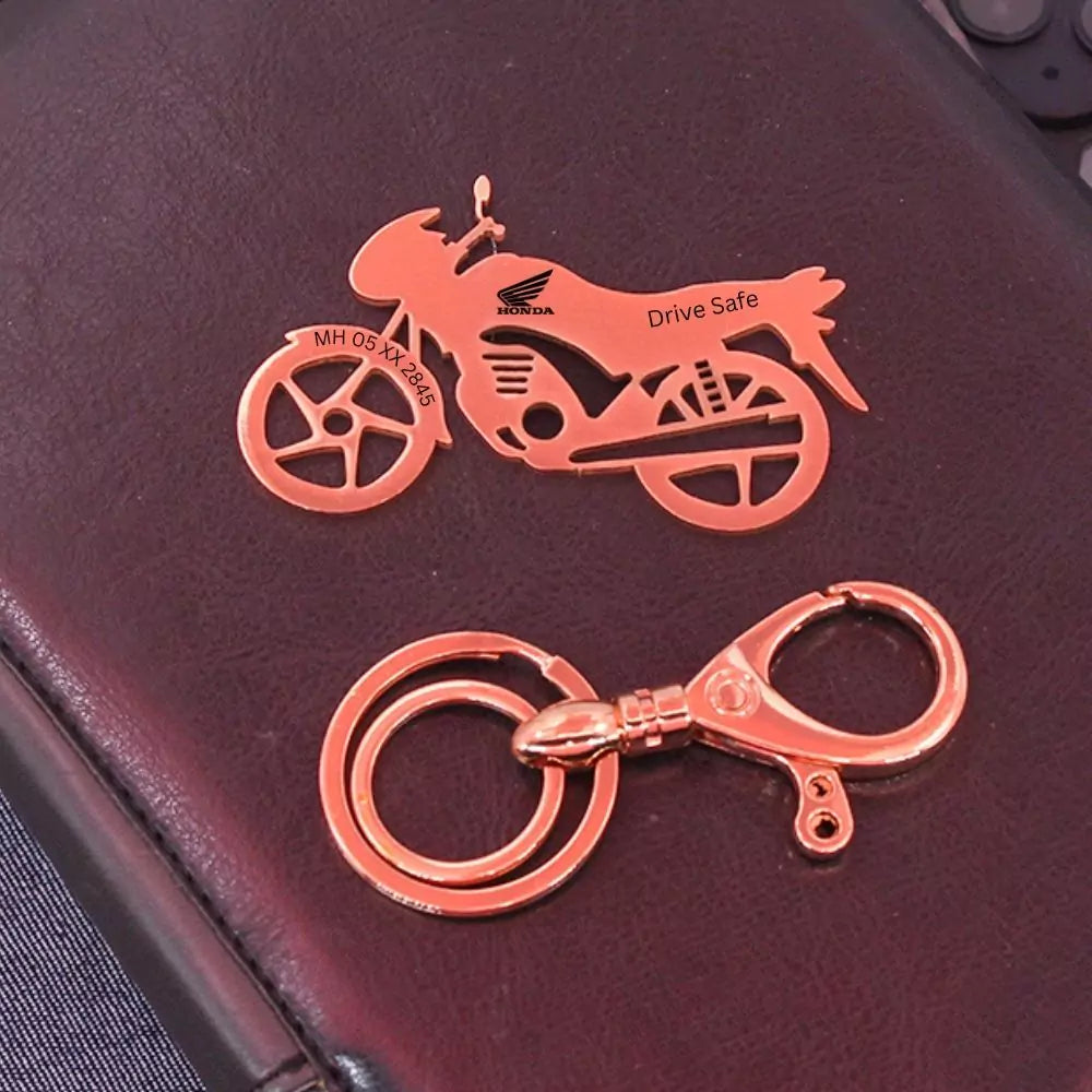 Minimal metal keychain inspired by Honda Shine SP reliability