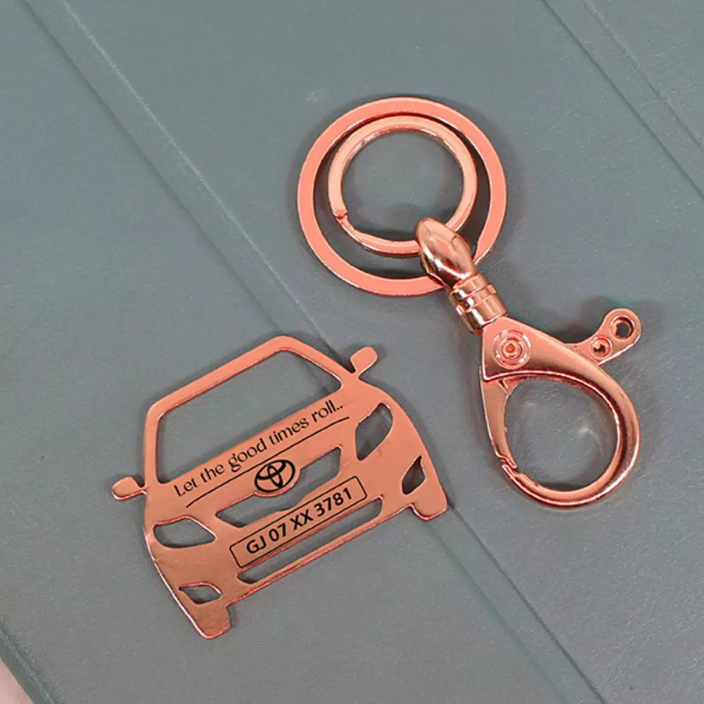 Rose gold personalized car keychain for Corolla lovers.