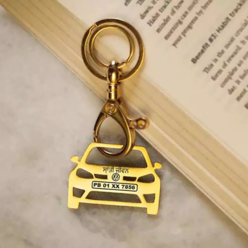 Luxury Vento keychain in silver, gold, and rose gold with personalized text