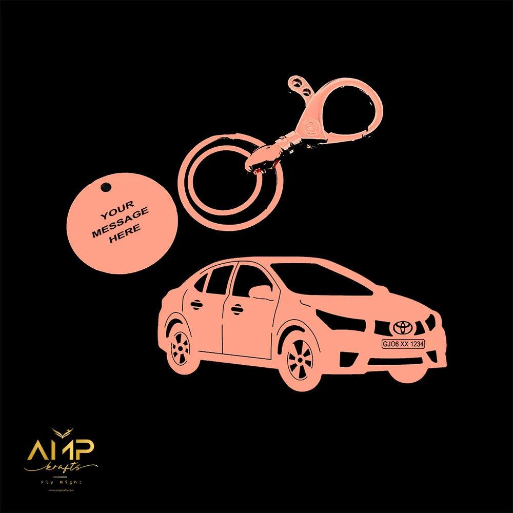 Rose gold Toyota Corolla Altis keychain, engraved with car details, perfect for gifting